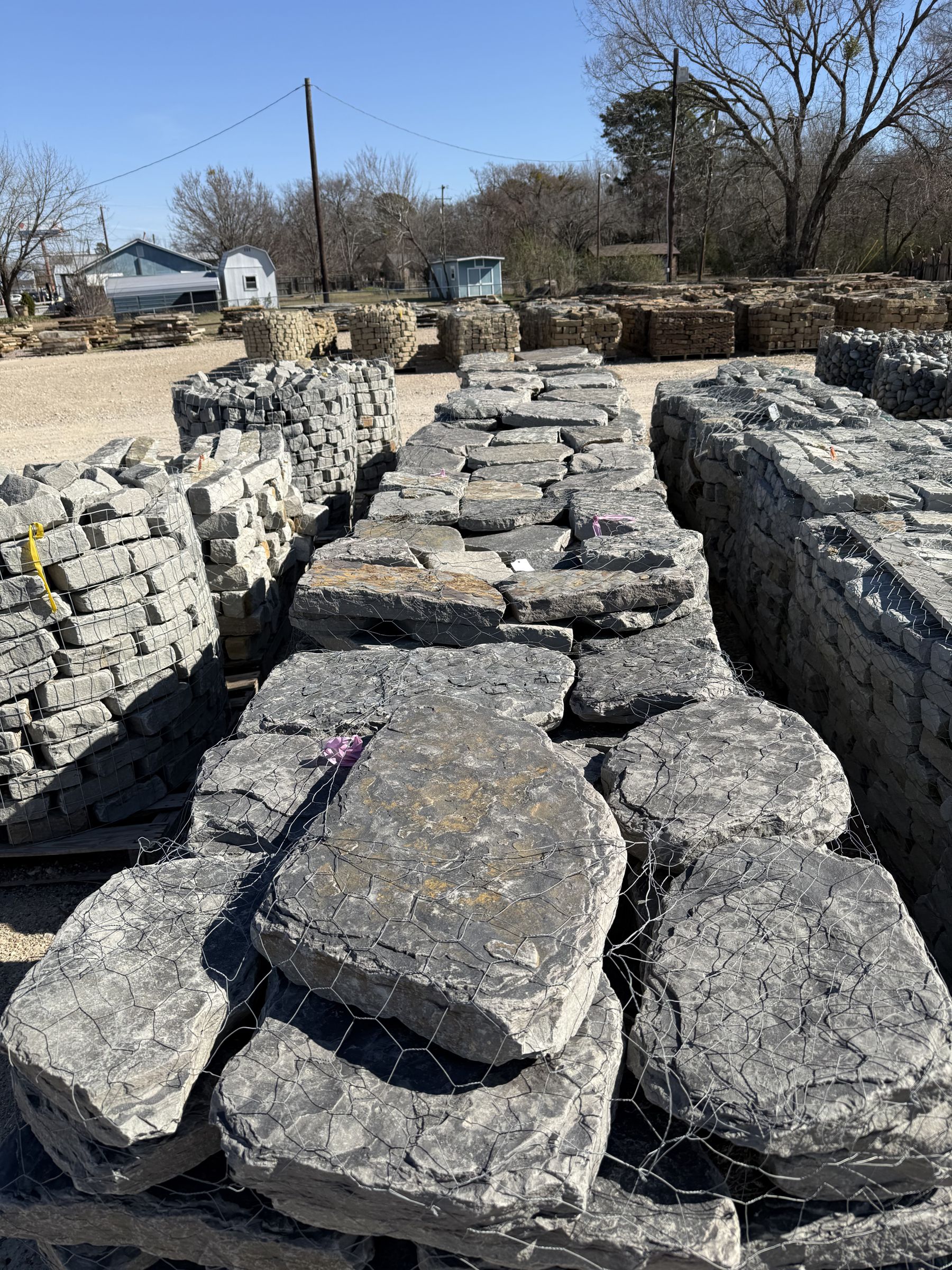 Pallets of charcoal flagstone builders