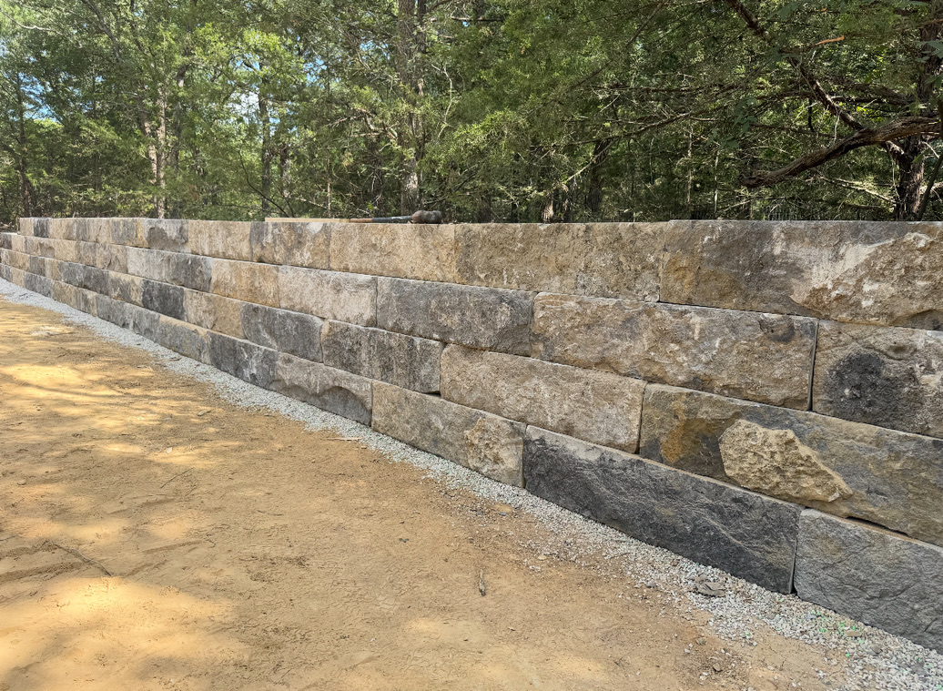 Lueders limestone block retaining wall in charcoal, buff and tan