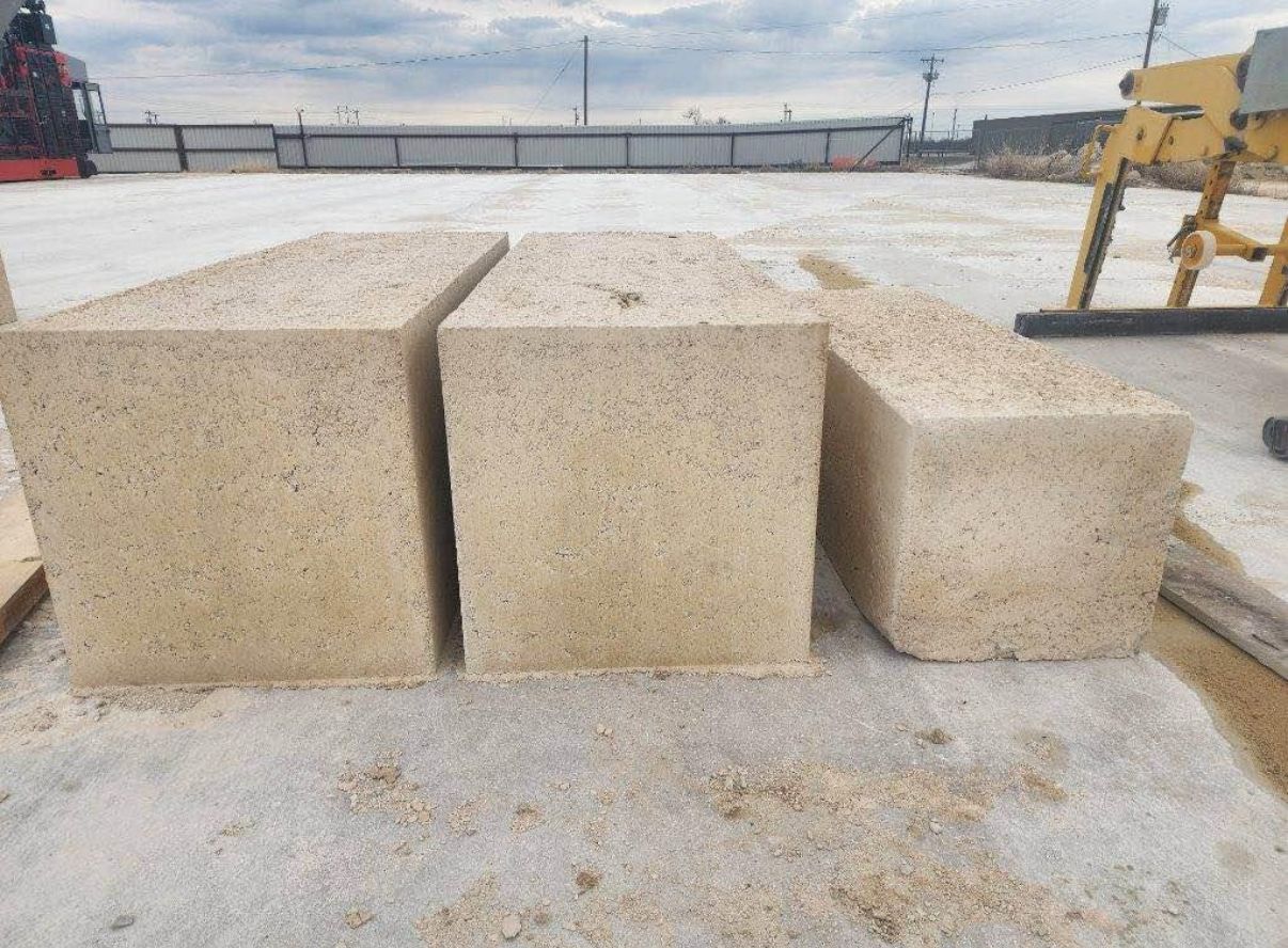 Manufactured limestone retaining wall blocks