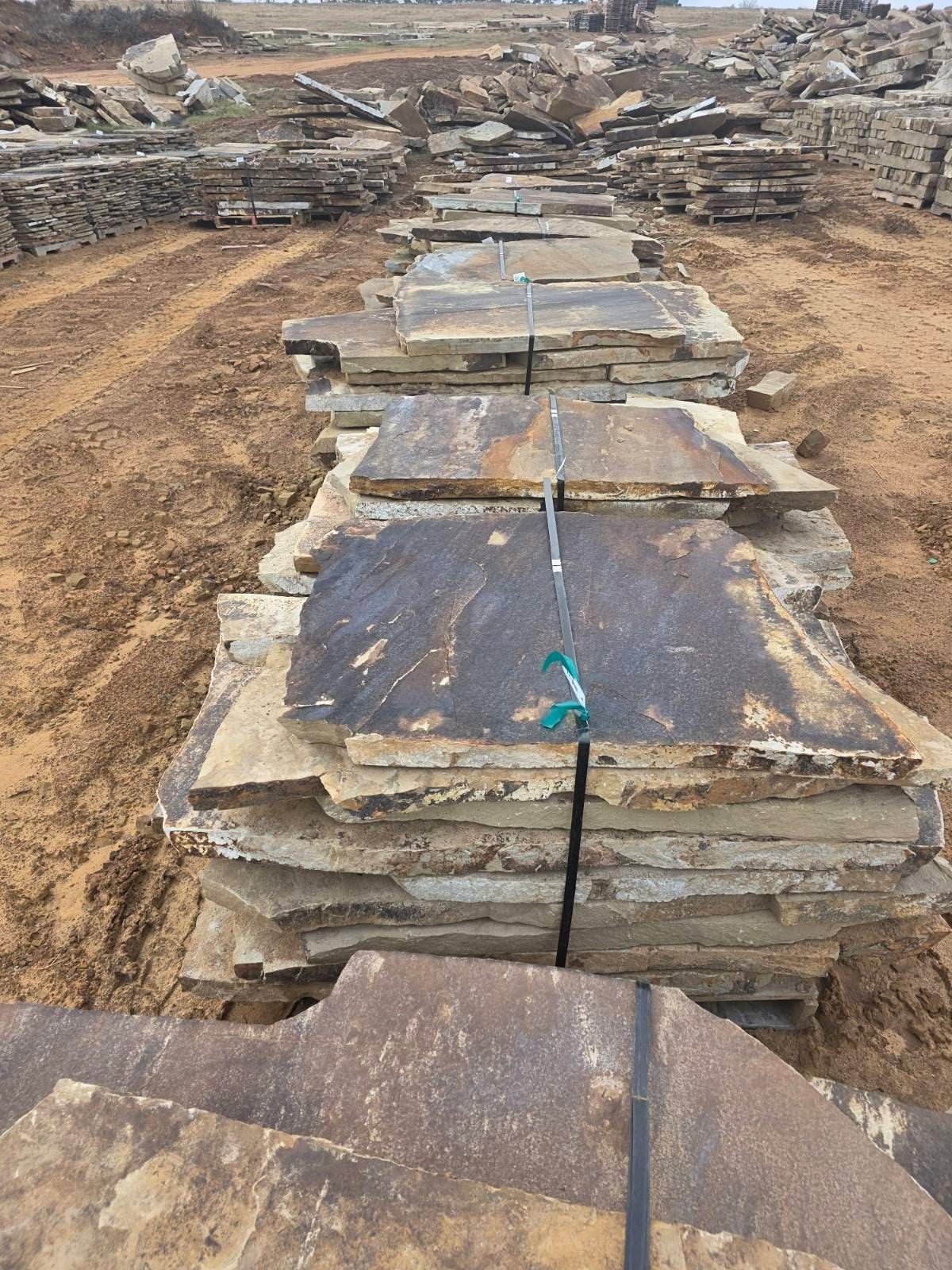 Pallets of large Oklahoma flagstone slabs at the quarry