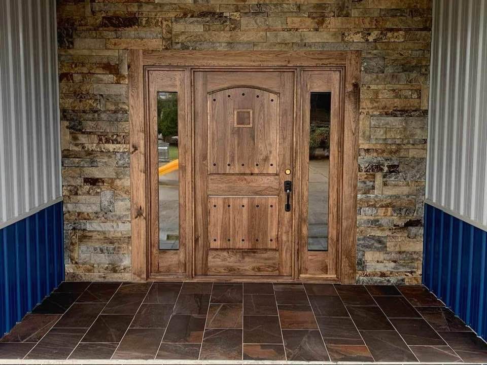 Entry wall finished in natural thin stone veneer