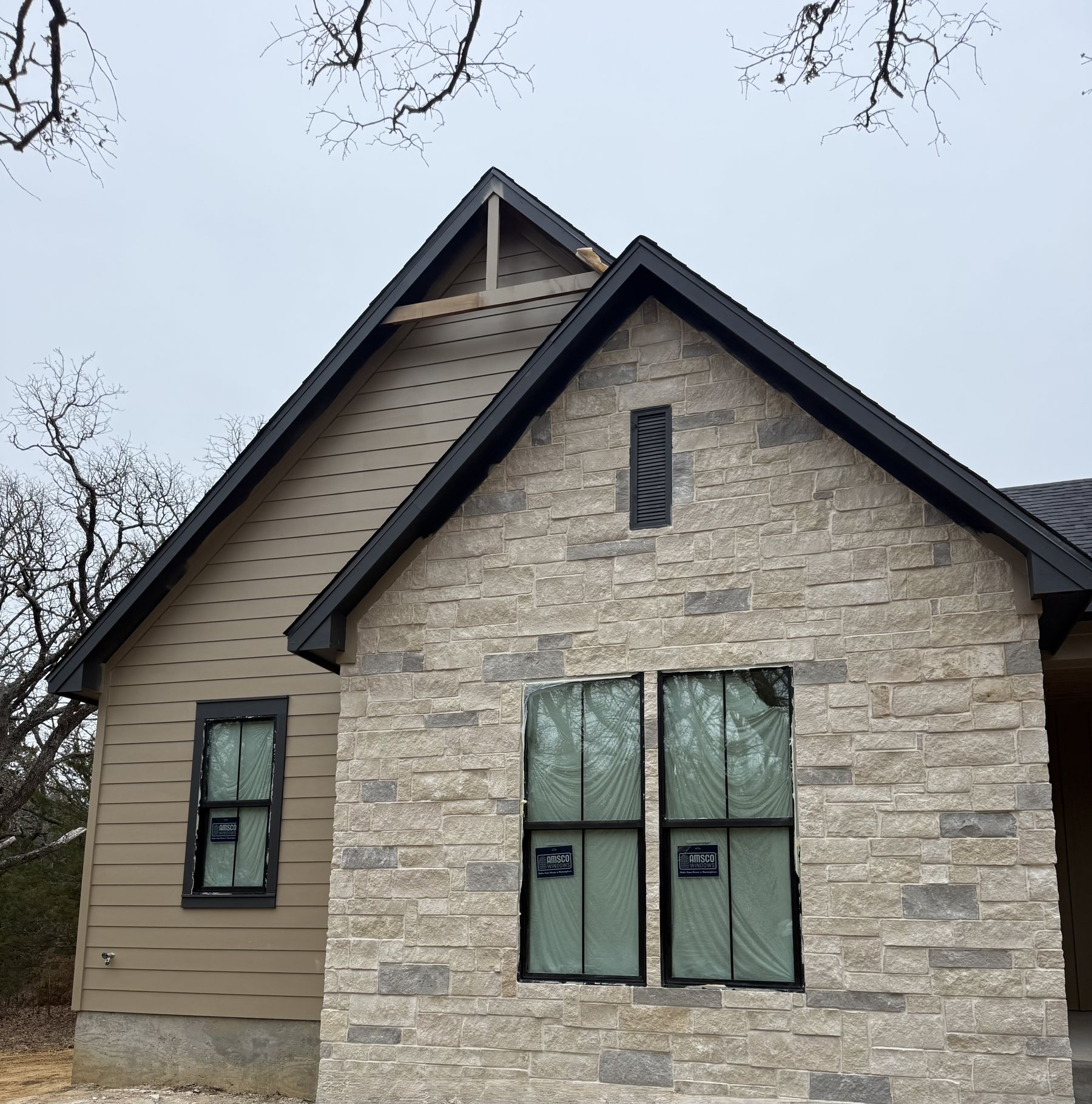 New home with natural stone veneer front